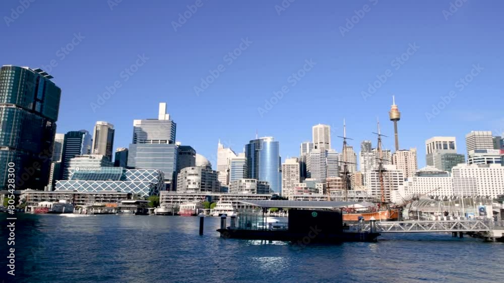 SYDNEY, AUSTRALIA - AUGUST 18, 2018: Panoramic view of Darling Harbor and city skyline. Sydney attracts 20 million people annually SYDNEY, AUSTRALIA - AUGUST 18, 2018: Panoramic view of Darling Harbor and city skyline. Sydney attracts 20 million people annually