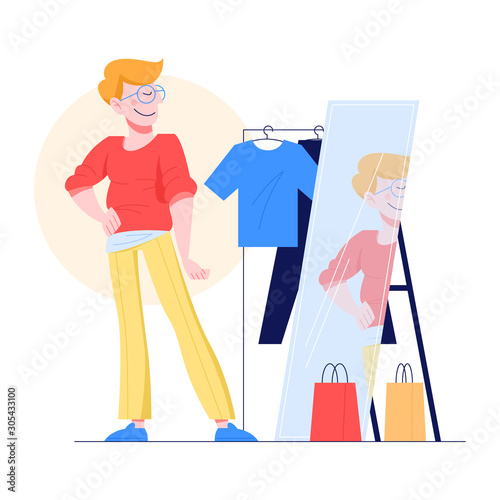 Young man choosing clothes. Guy trying on new clothes