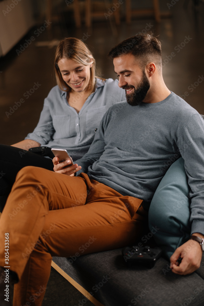 Fototapeta premium Young happy couple. Boyfriend and girlfriend having fun.