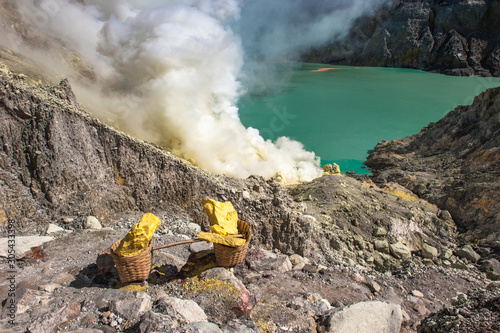 Obraz na plátně Baskets of sulfur at Kawah Ijen volcano, Java, Indonesia