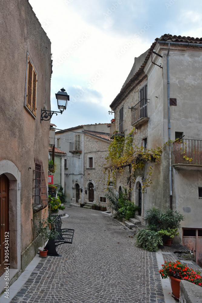 Fornelli, 11/23/2019. A narrow street among the old houses of a mountain village in the Molise region
