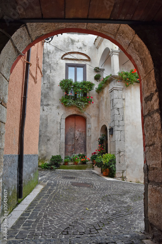 Fornelli  11 23 2019. A narrow street among the old houses of a mountain village in the Molise region