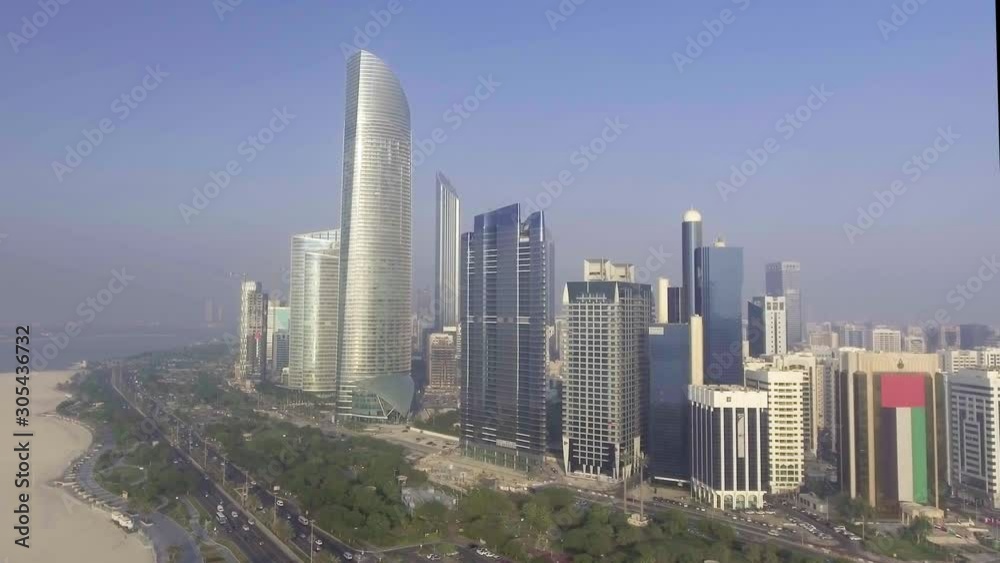 Abu Dhabi skyline from the sea, aerial view - UAE. Abu Dhabi skyline from the sea, aerial view - UAE.