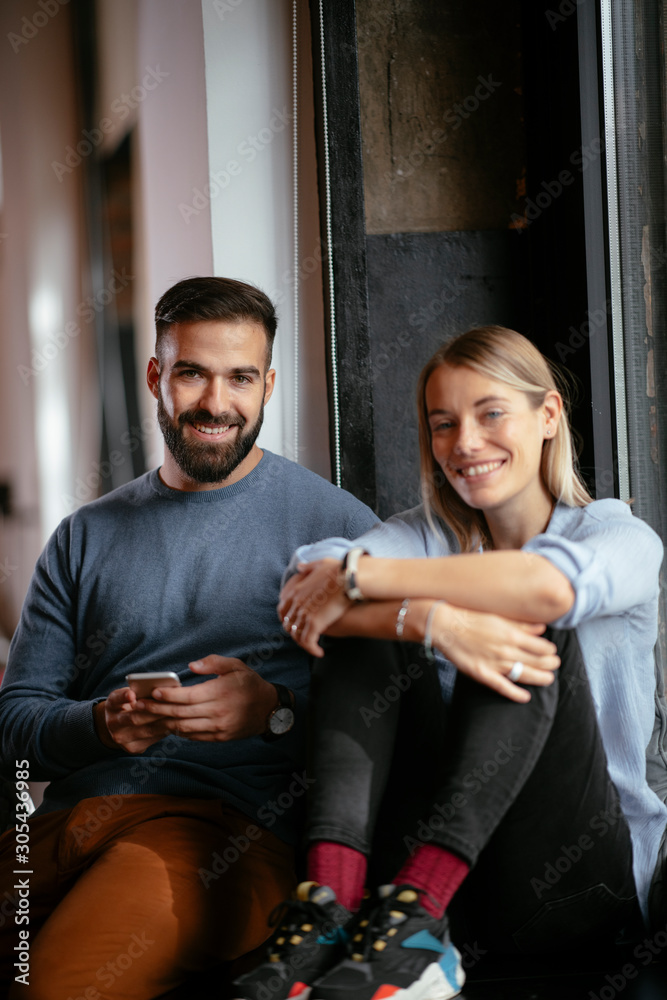 Young happy couple. Boyfriend and girlfriend having fun.
