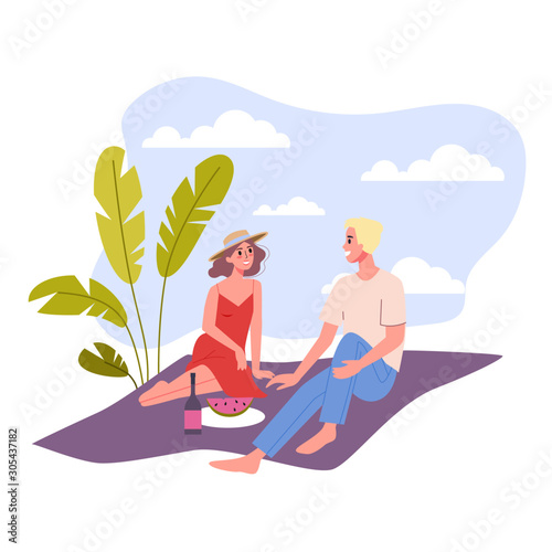 People relax on the beach