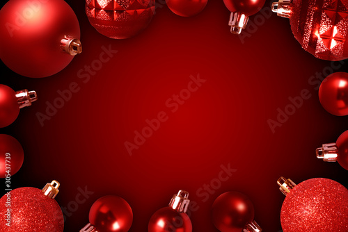 Hanging Red Christmas Baubles On Red Background