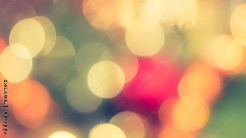 Christmas tree bokeh blur abstract background for merry x'mas party and new year celebration in red green gold color for xmas holiday night light Christmas tree bokeh blur abstract background for merry x'mas party and new year celebration in red green gold color for xmas holiday night light
