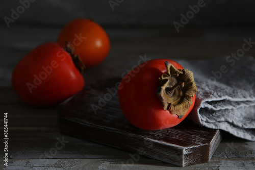 Obraz na płótnie Persimmon, the power fruit in autumn w salonie