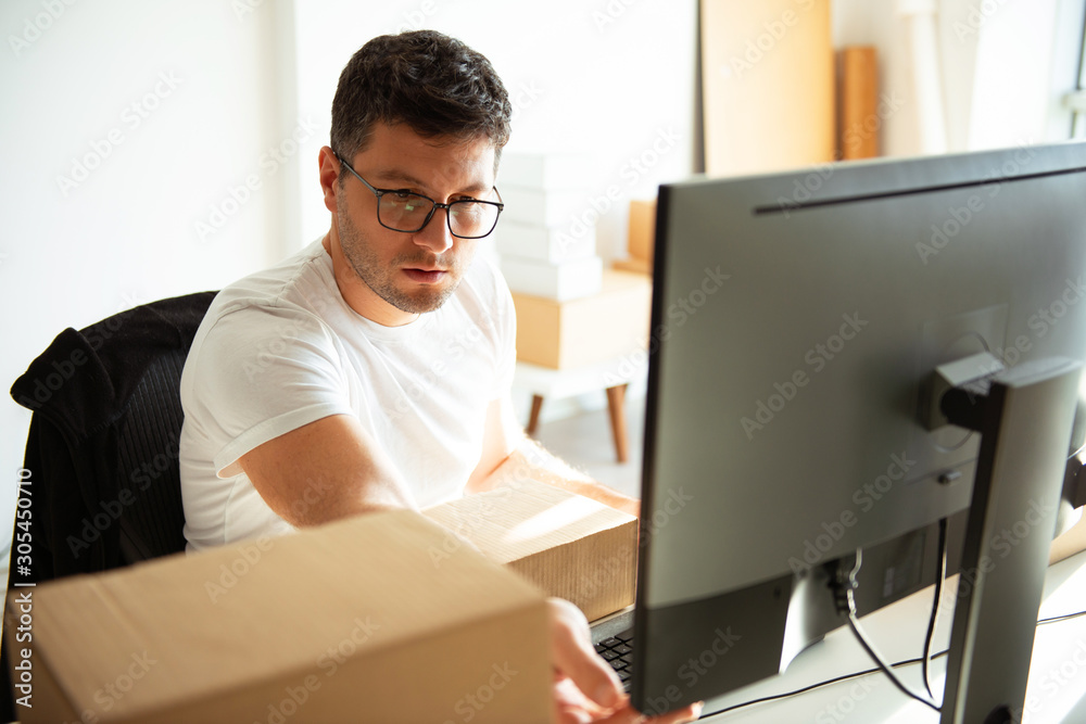 Young Man Working in Delivery Service Young Man Working in Delivery Service