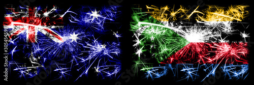 Australia, Ozzie vs Comoros, Comorian New Year celebration sparkling fireworks flags concept background. Combination of two abstract states flags. © Vlad