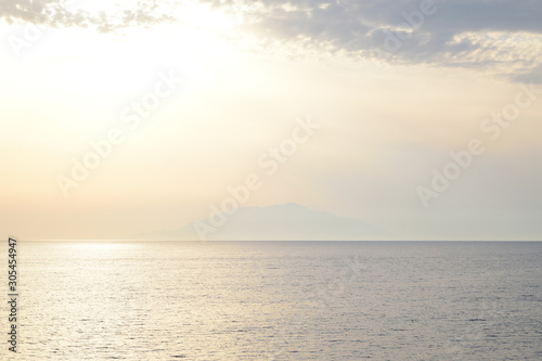 Seascape - view of Samothraki island Greece on sunset - from ferry to Gokceada island, Canakkale, Turkey