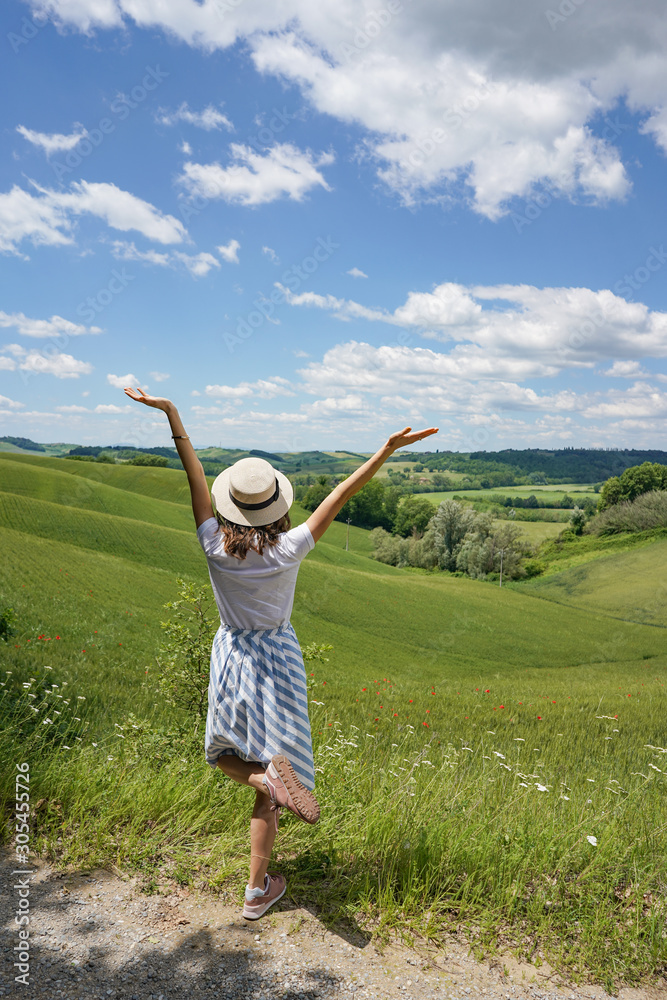 Tourist woman enjoying the fantastic view in Tuscany. Tourist woman enjoying the fantastic view in Tuscany.