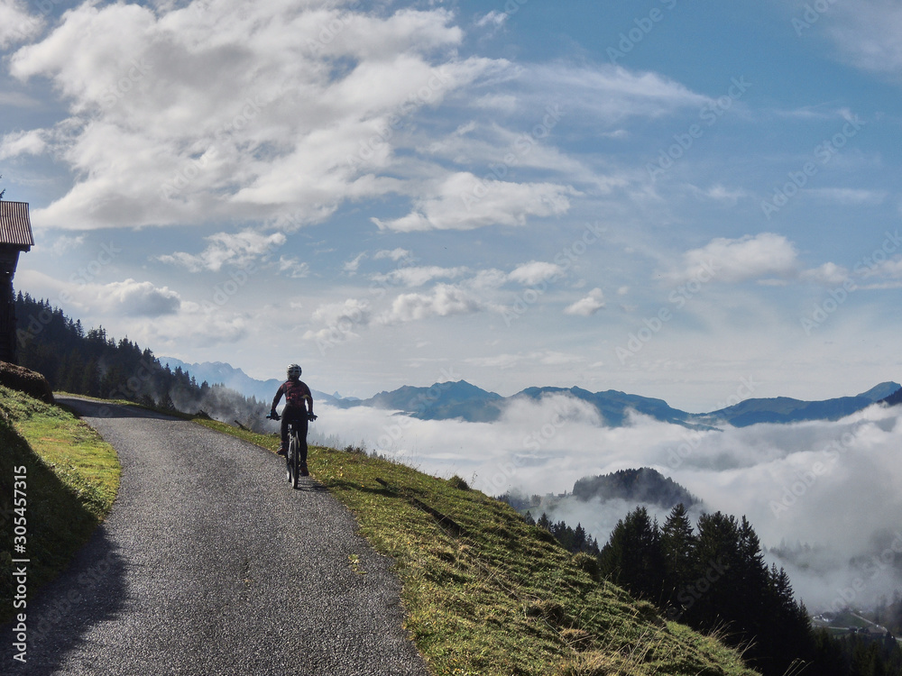 Cyclists in the Col des Mosses, in the west of the Bernese Alps of Switzerland