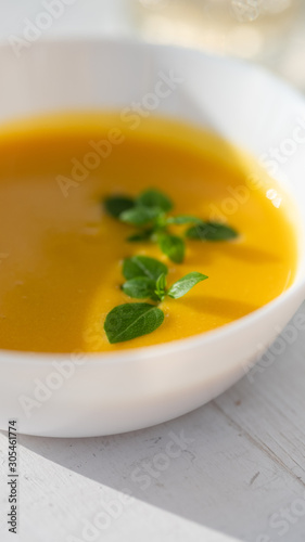 pumpkin soup with herbs. vegan food. 