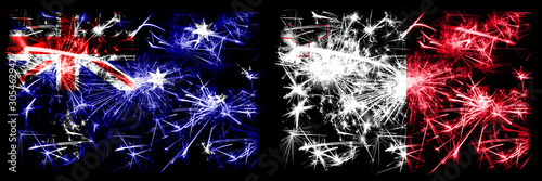 Australia, Ozzie vs Malta, Maltese New Year celebration sparkling fireworks flags concept background. Combination of two abstract states flags. © Vlad