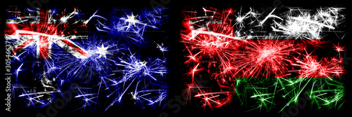 Australia, Ozzie vs Oman, Omani New Year celebration sparkling fireworks flags concept background. Combination of two abstract states flags. © Vlad