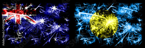 Australia, Ozzie vs Palau, Palaulan New Year celebration sparkling fireworks flags concept background. Combination of two abstract states flags. © Vlad