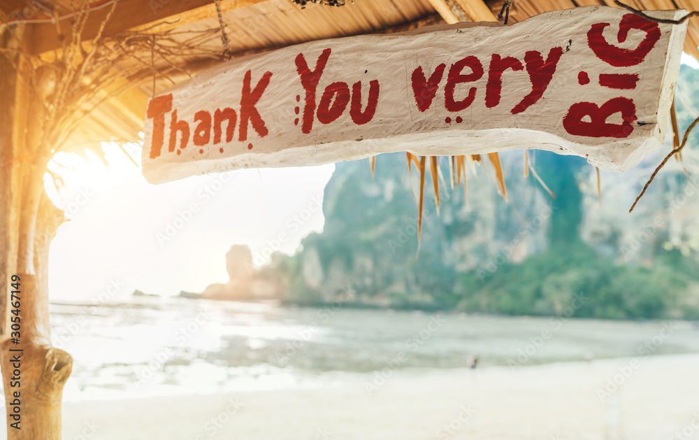 "Thank You very BIG" sign in exotic bungalow on the sandy Thai beach