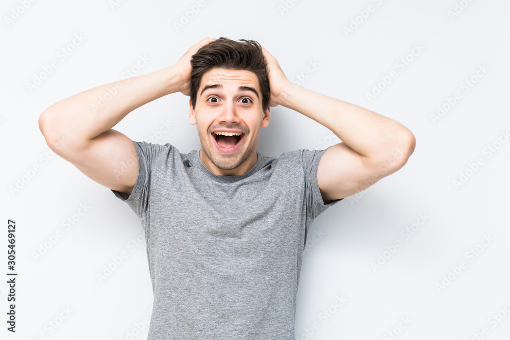 Shocked young man isolated on white background Shocked young man isolated on white background