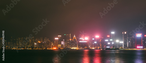 Hong Kong city landscape day and evening with lights. Skyscrapers overlooking the mountains and the sea day and evening. Night lights. China
