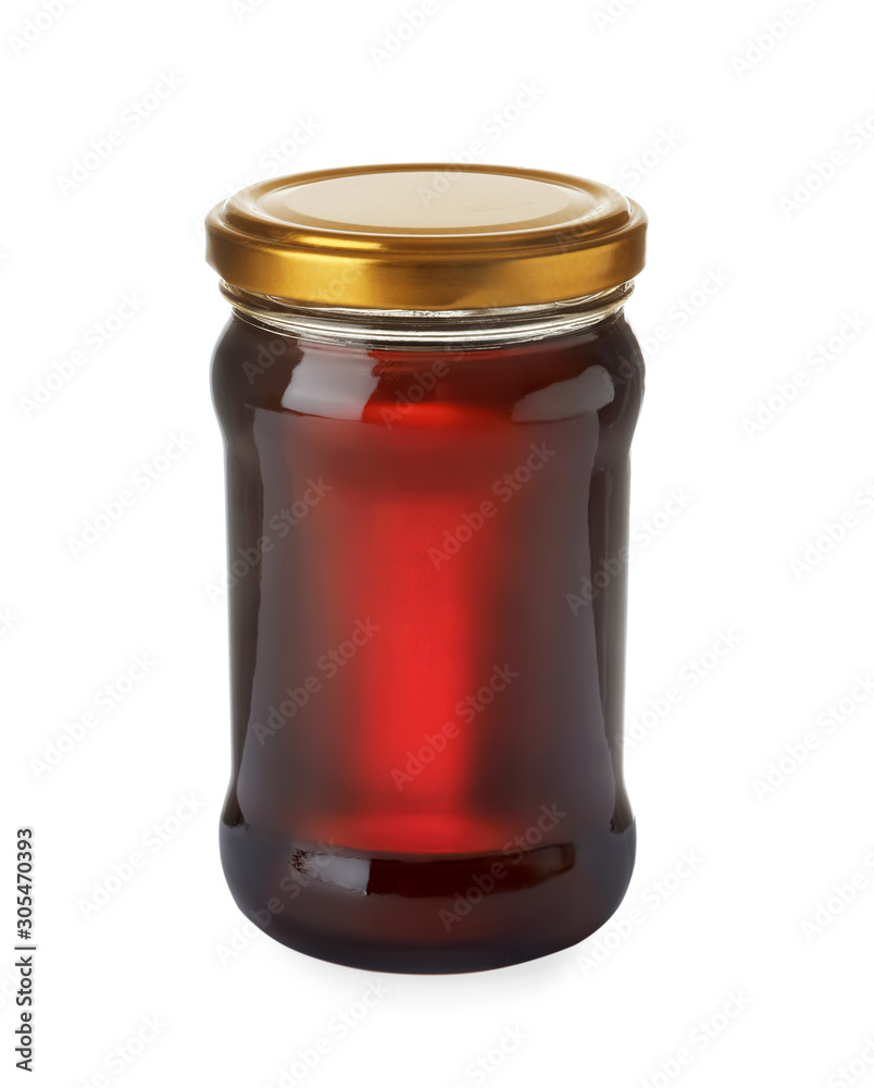Jar with organic honey isolated on white
