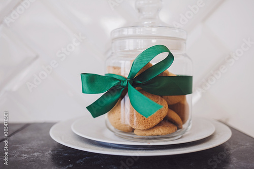 cookies in a jar with a festive ribbon for Christmas or Valentine's day