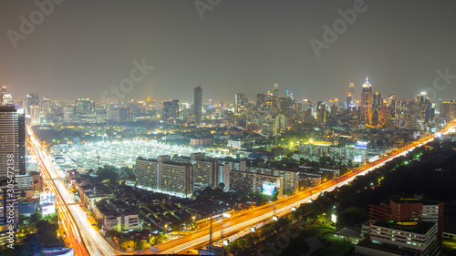 Panorama of the office building in Capital of Thailand with lighting at night, Bangkok, Thailand.