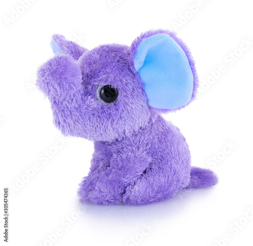 Elephant plushie doll isolated on white background with shadow reflection. Plush stuffed puppet on white backdrop. Purple or violet fluffy elephant toy for children. Cute furry animal plaything. photo