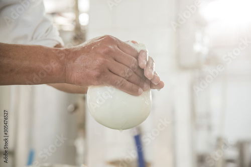 Caseificio con lavorazione mozzarella di bufala photo