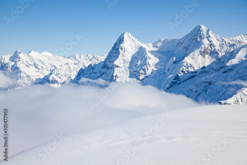 amazing snow covered peaks in the Swiss alps Jungfrau region from Schilthorn