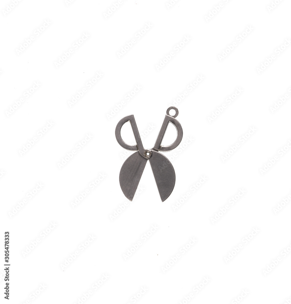 steel scissors, key chain isolated on a white background steel scissors, key chain isolated on a white background