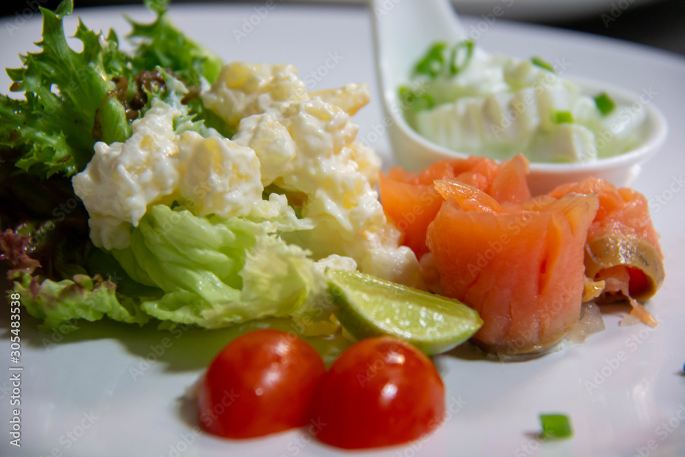 smoke salmon salad and sauce on plate smoke salmon salad and sauce on plate