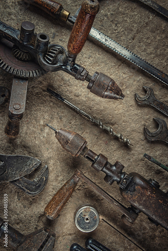 collection of old craft tools, still life with rusty tools, product photography for industry 