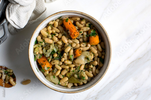 Flageolet beans with herbs and carrots photo