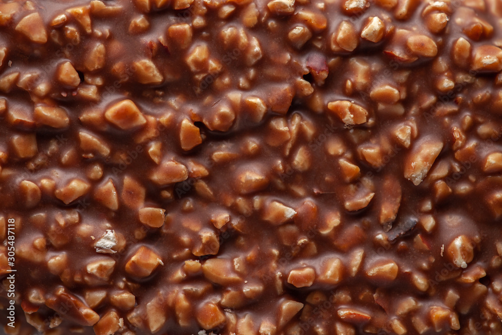 Chocolate texture. Сhocolate with nuts. Сlose-up. Chocolate texture. Сhocolate with nuts. Сlose-up.