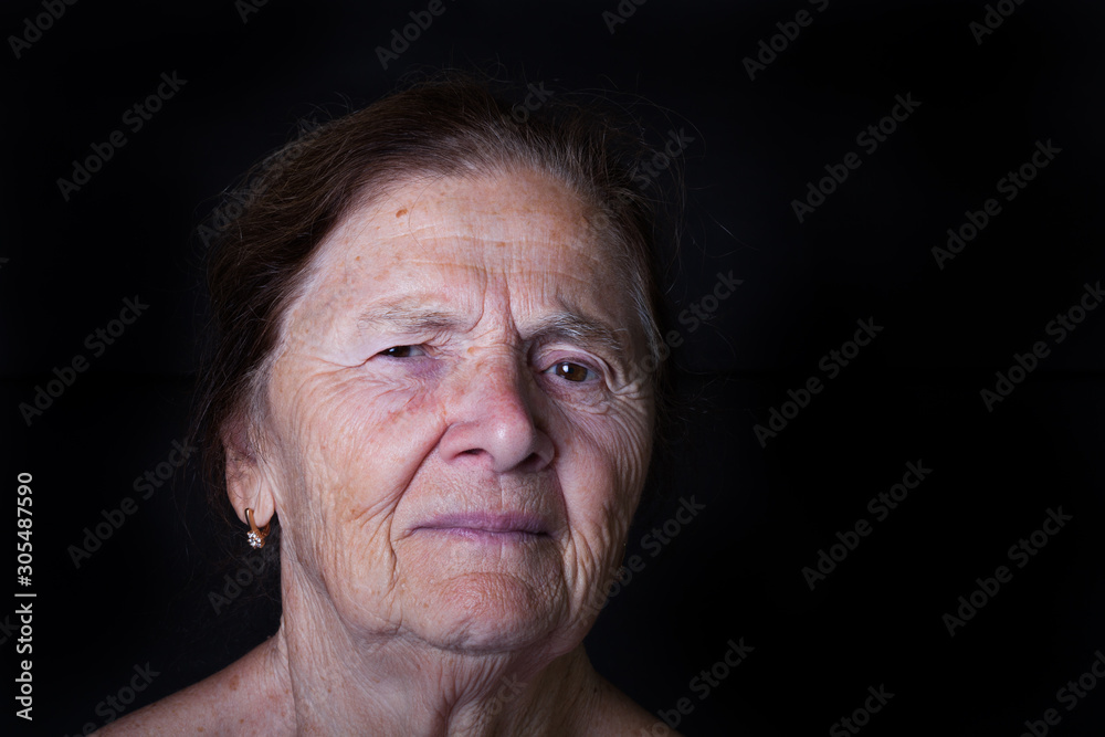 Portrait of an elderly woman with bright emotions on his face Portrait of an elderly woman with bright emotions on his face