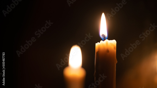 close up candle light in the dark macro photography texture background