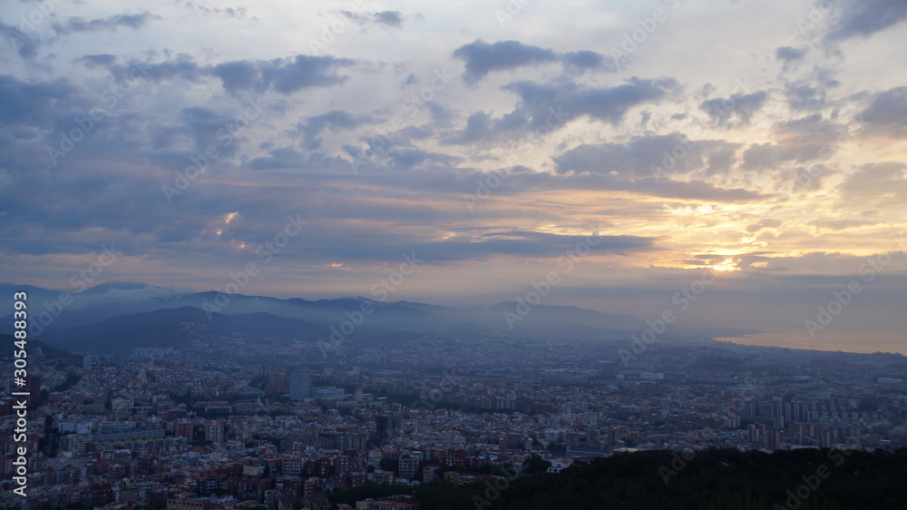 Dawn in Barcelona in the spring. View of Barcelona in the morning from the bunker