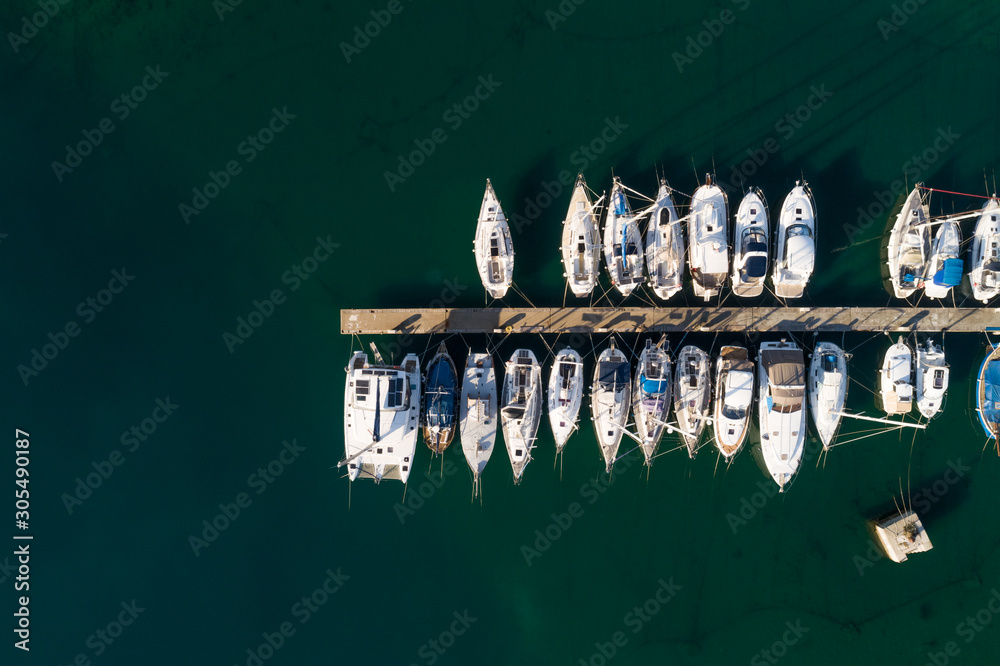 Aerial view above of boats anchored at marina near Osor, Croatia. Aerial view above of boats anchored at marina near Osor, Croatia.