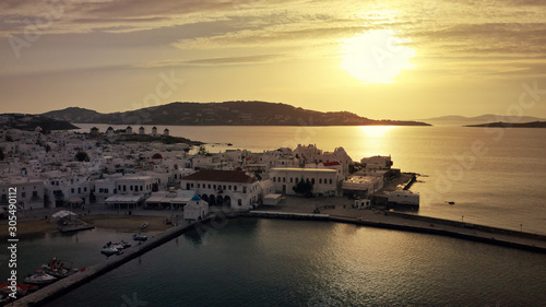 Aerial drone panoramic photo of picturesque old port in main village of Mykonos island at sunrise with beautiful colours, Cyclades, Greece