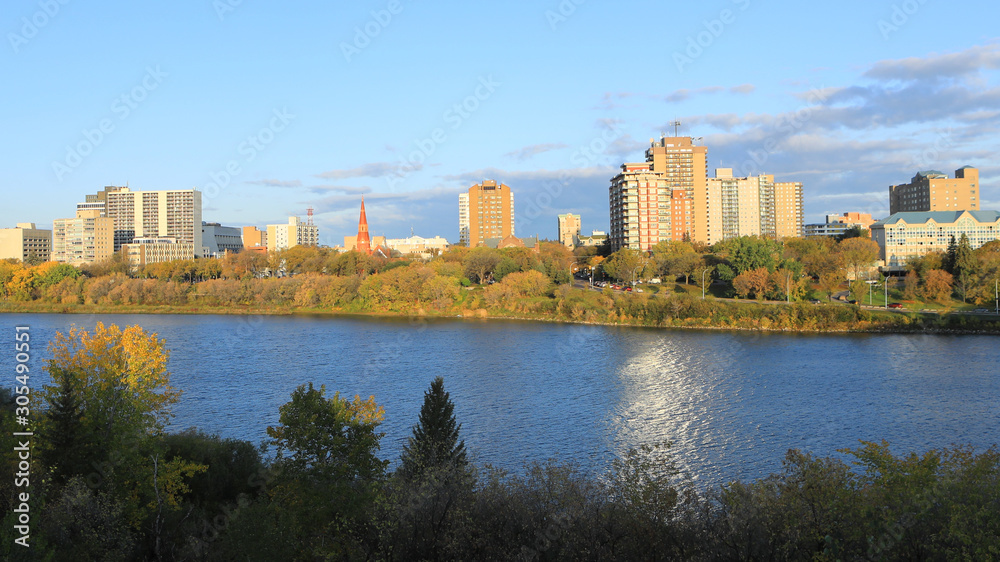 Scene of Saskatoon, Canada skyline by river