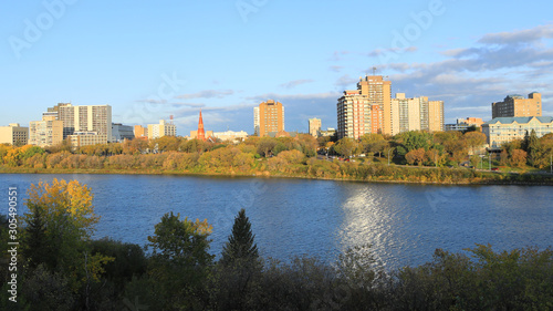 Scene of Saskatoon, Canada skyline by river