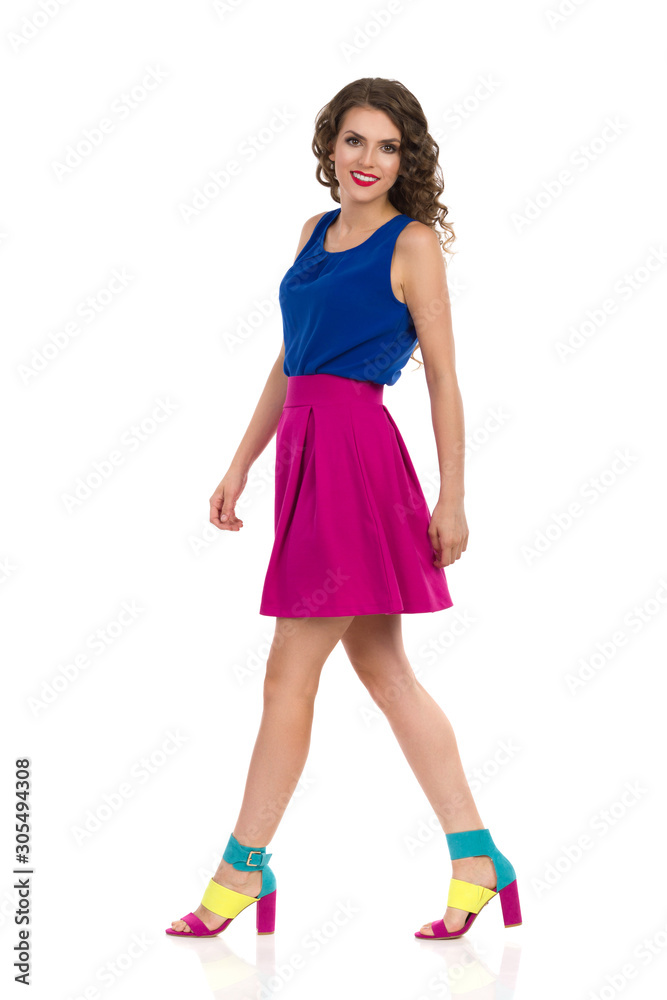 Beautiful Walking Woman In Colorful Clothes And High Heels Beautiful Walking Woman In Colorful Clothes And High Heels