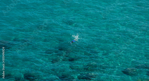 swimming in the sea © Marco