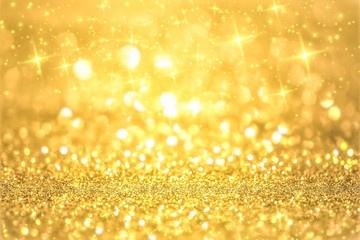 Luxury gold glitter with bokeh background, de-focused. concept for chrismas, holiday, happy new year, decoration.