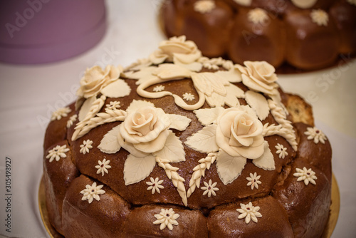 Traditional wedding Ukrainian bread Korovai with flowers photo