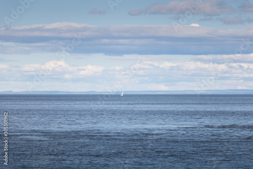 A sailing boat on the Saint-Lawrence river. 