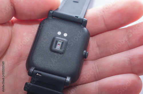 The back of smart watch with a pulse oximeter and arterial blood pressure sensor. 