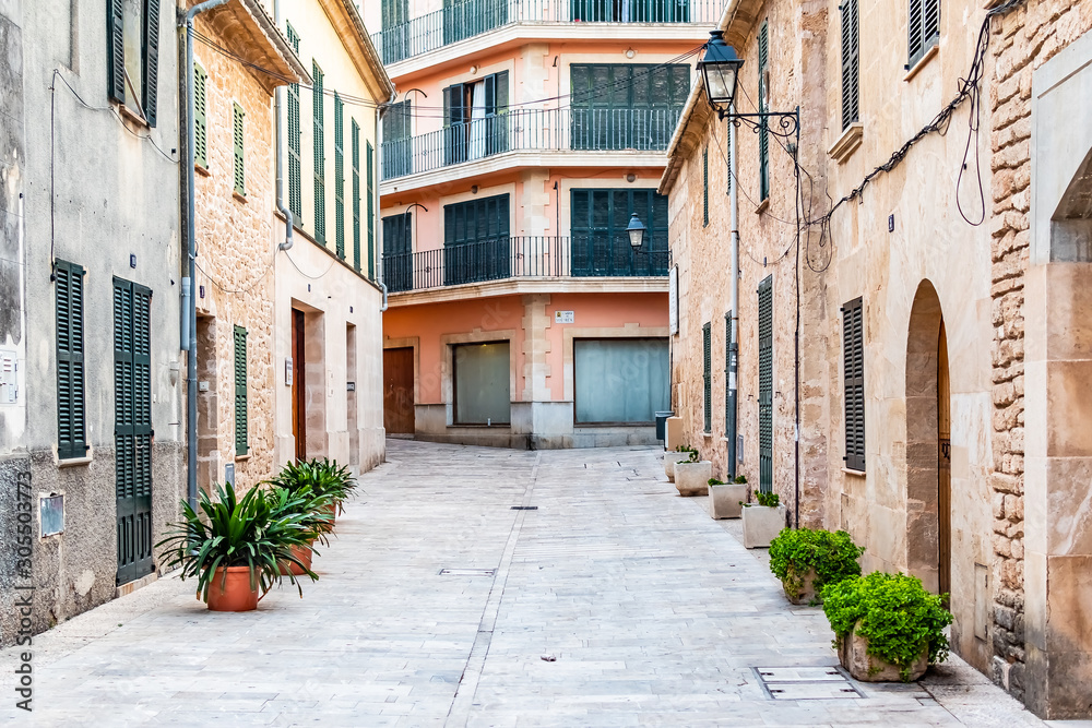 Beautiful narrow historic streets of Alcudia Old Town in Majorca Mallorca
