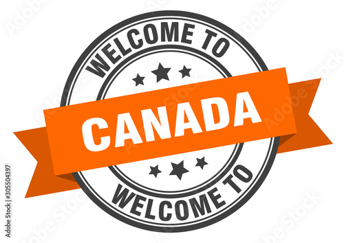 Canada stamp. welcome to Canada orange sign